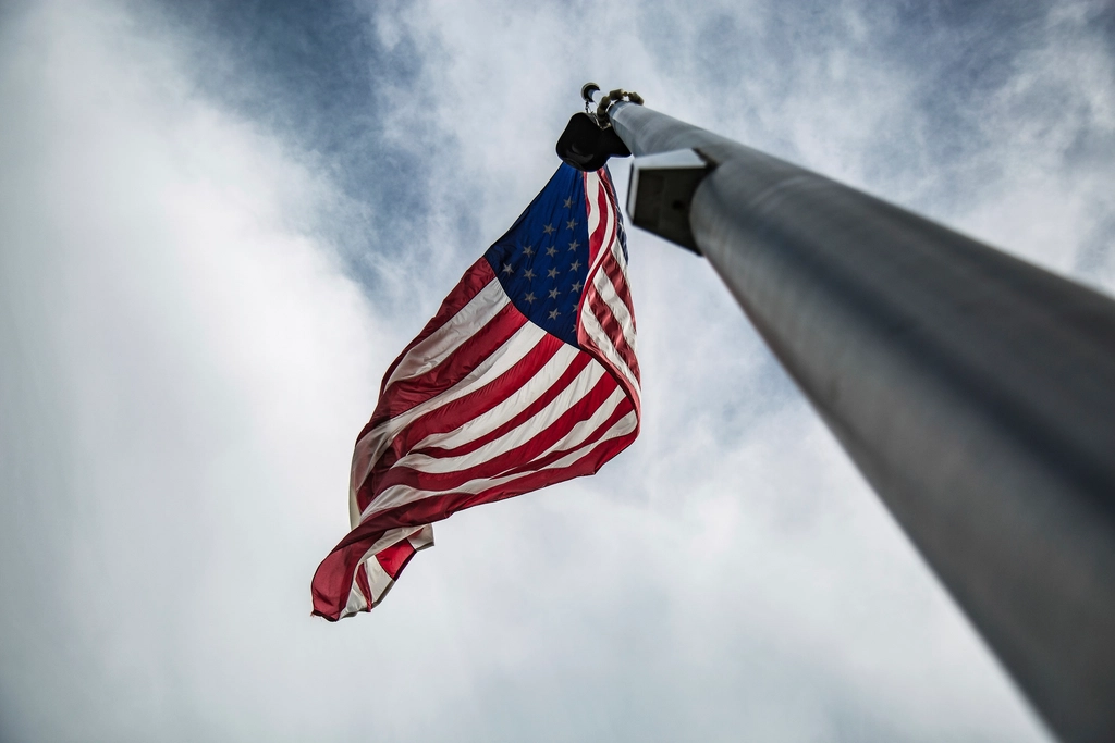 American flag hanging flag pole